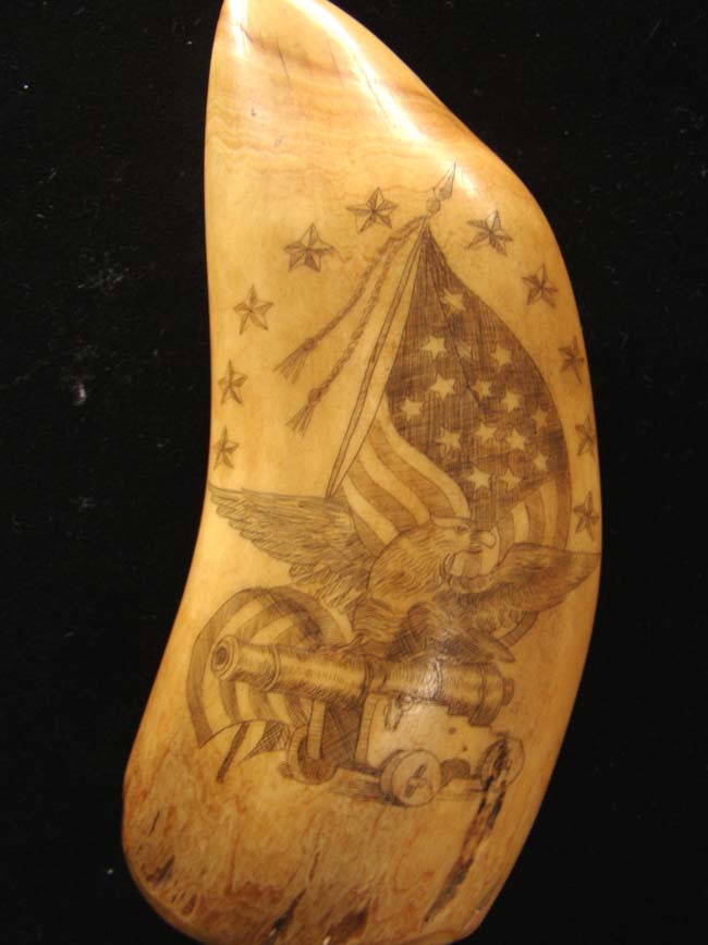 A beautiful late 19th/early 20th century scrimshawed whale's tooth with War of 1812 Battle of Lake Erie.